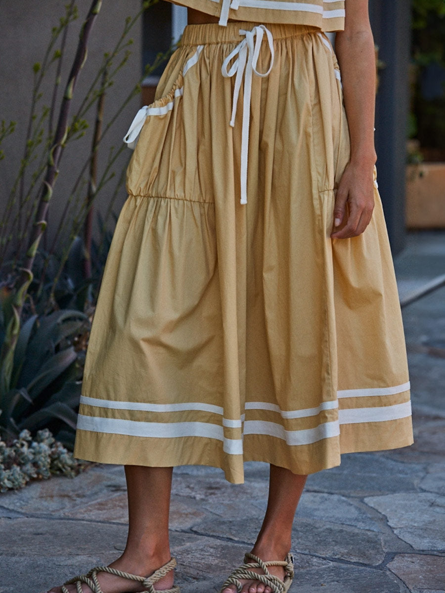 WOVEN COTTON FLARE MIDI SKIRT - DUSTY YELLOW